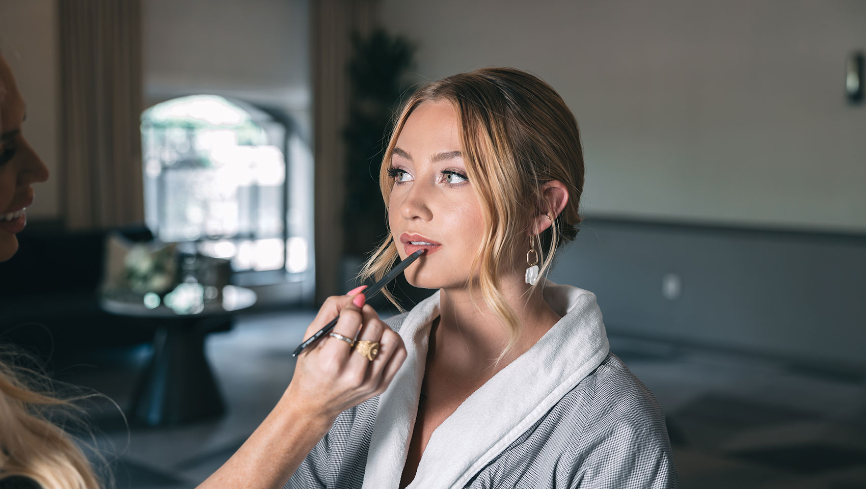 Bride getting her makeup done