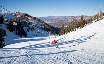 skier skiing down mountain