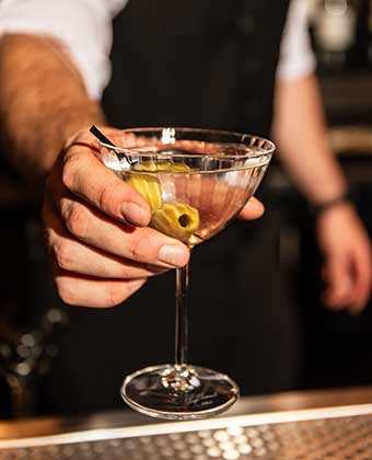 bartender with martini glass